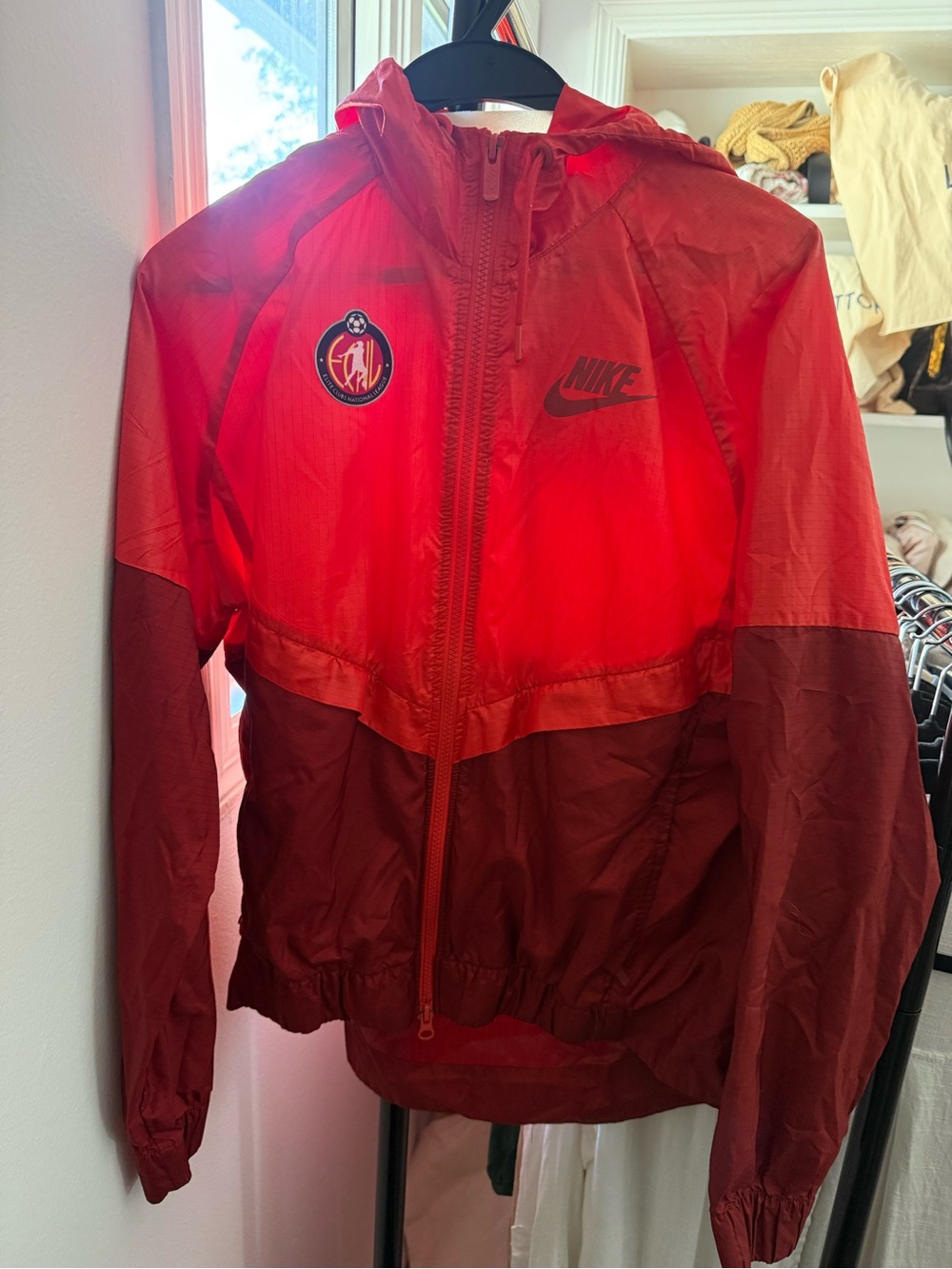 Nike women’s Red Colorblock Hooded Windbreaker Jacket